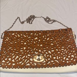 Miztrique cream clutch with removable strap